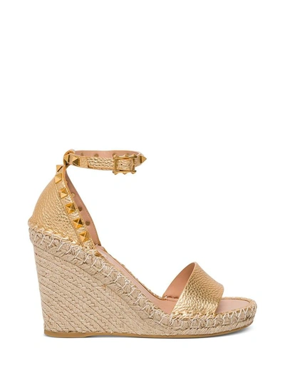 Shop Valentino Rockstud Double Wedge Sandal In Laminated Leather In Metallic