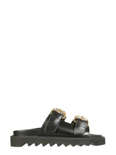 Shop Moschino Sandals With Buckles In Black