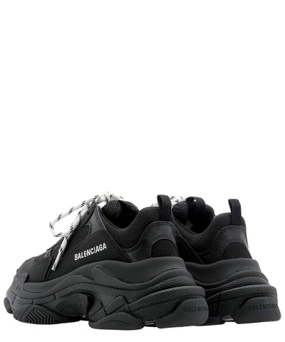 Shop Balenciaga "triple S" Sneakers In Black  
