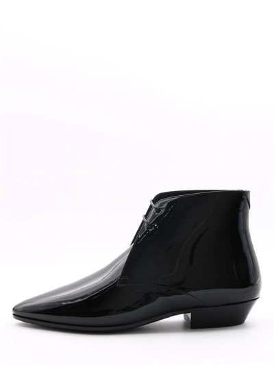 Shop Saint Laurent Patent Jonas Ankle Boots In Black