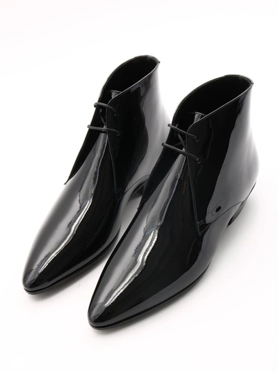 Shop Saint Laurent Patent Jonas Ankle Boots In Black