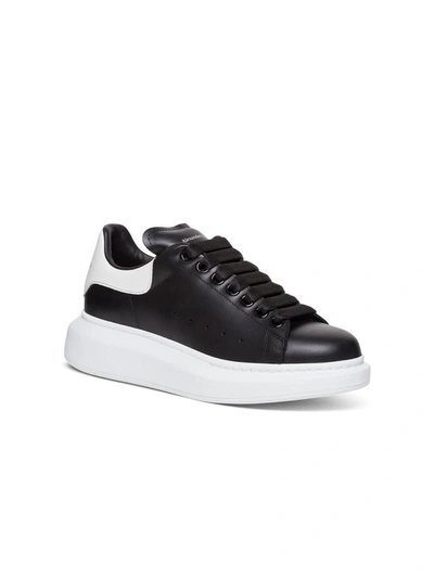 Shop Alexander Mcqueen Larry Sneakers In White/black