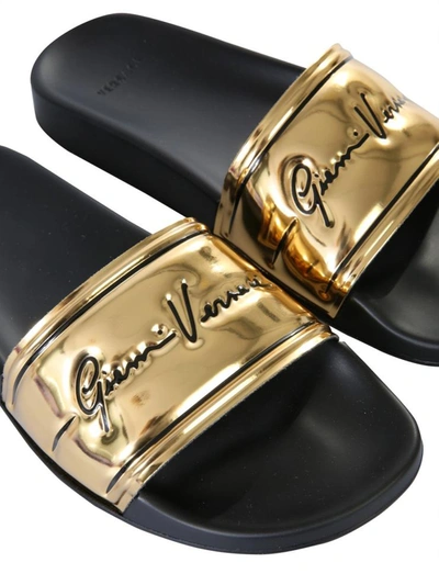Shop Versace Slide Sandals With Logo In Gold