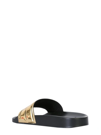 Shop Versace Slide Sandals With Logo In Gold