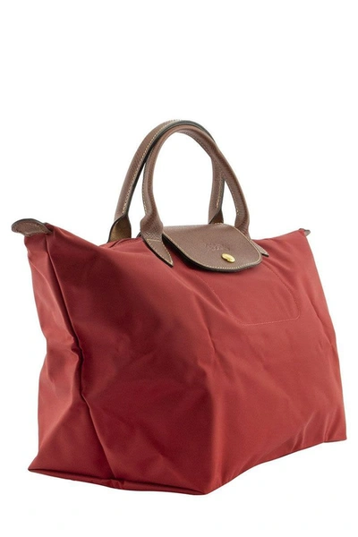 Shop Longchamp Le Pliage - Top Handle M In Red