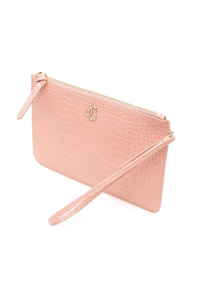 Shop Jimmy Choo Fara Monogram Pouch In Blush