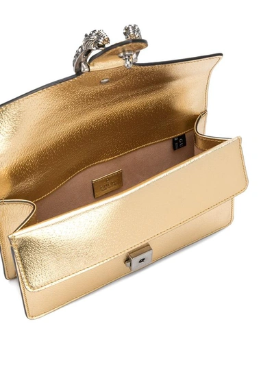Shop Gucci Bags.. Golden