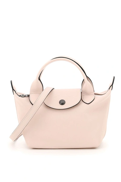 Shop Longchamp Le Pliage Cuir Mini Handbag In Rosa