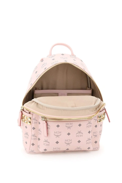 Shop Mcm Stark Visetos Backpack With Side Studs In Powder Pink