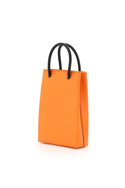 Shop Balenciaga Phone Tote Bag In Orange