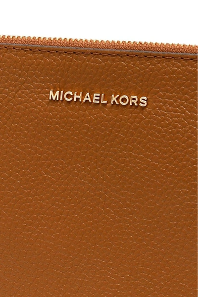 Shop Michael Michael Kors Crossbody Clutch In Luggage