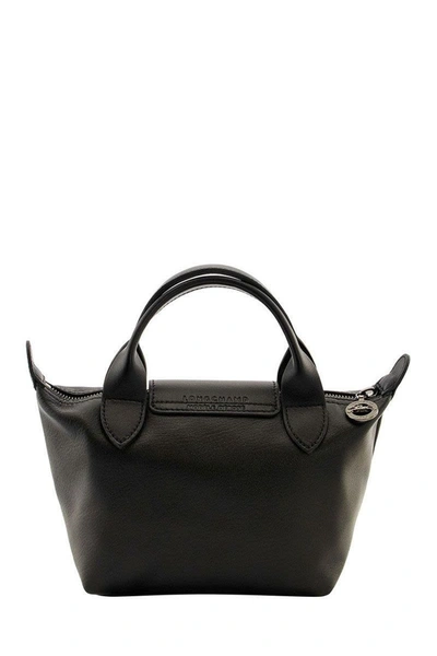 Shop Longchamp Le Pliage Cuir - Top Handle Bag Xs In Black/ebony