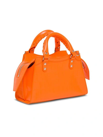 Shop Balenciaga Neo Classic Mini Handbag In Crocodile Print Leather In Orange