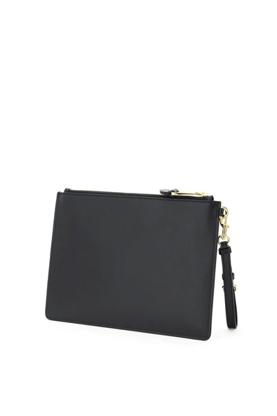 Shop Moschino Logo Print Clutch In Fantasia Nero