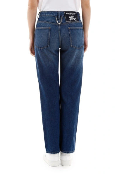 Shop Burberry Jeans With Chain In Indigo