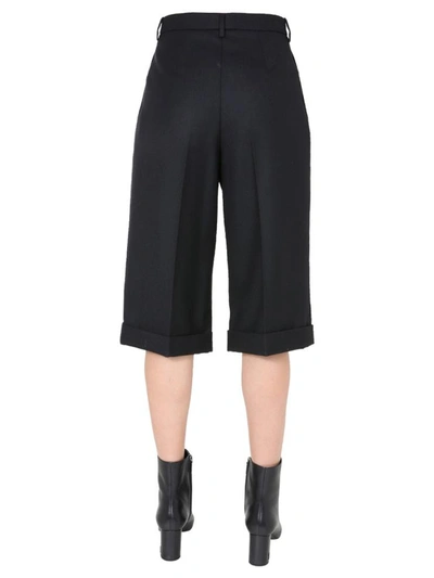 Shop Saint Laurent Cropped Trousers In Black