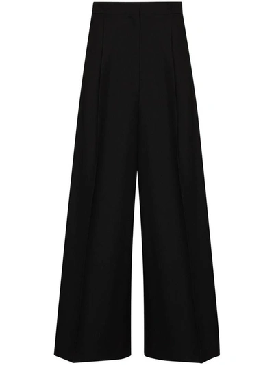 Shop Loewe Trousers Black