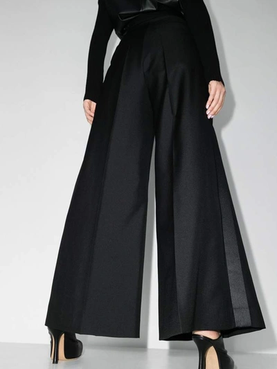 Shop Loewe Trousers Black