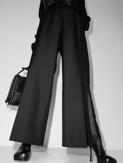 Shop Loewe Trousers Black