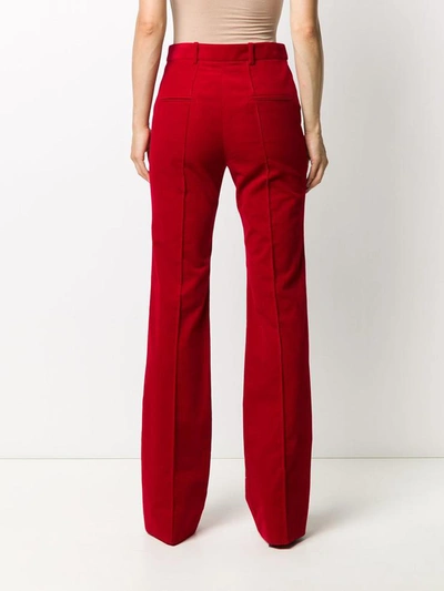 Shop Saint Laurent Trousers Red