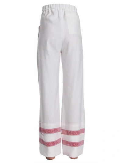Shop Jw Anderson Wide Trousers In White