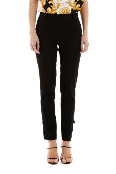 Shop Versace Safety Pin Trousers In Nero