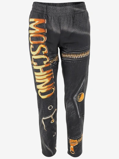 Shop Moschino Trousers In Nero