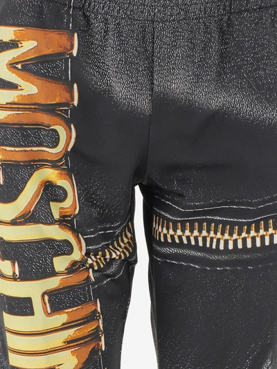 Shop Moschino Trousers In Nero