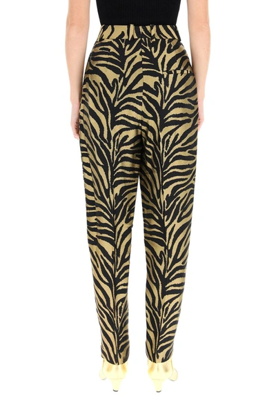 Shop Khaite Magdeline Zebra Print Trousers In Gold Black Zebra