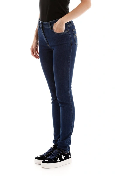 Shop Moschino Teddy Bear Jeans In Denim