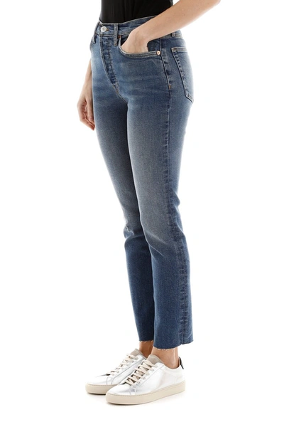 Shop Re/done Raw Cut Slim Jeans In Aged Blue