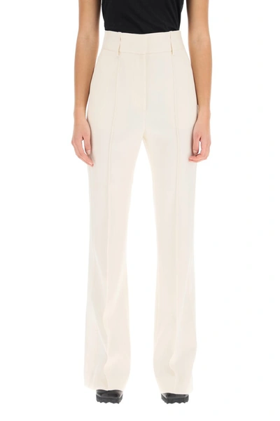 Shop Givenchy Flare Wool Pants In White