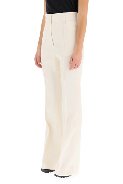 Shop Givenchy Flare Wool Pants In White