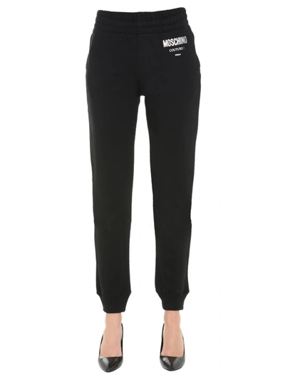 Shop Moschino Jogging Pants In Black