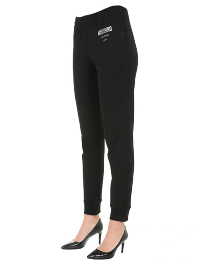 Shop Moschino Jogging Pants In Black