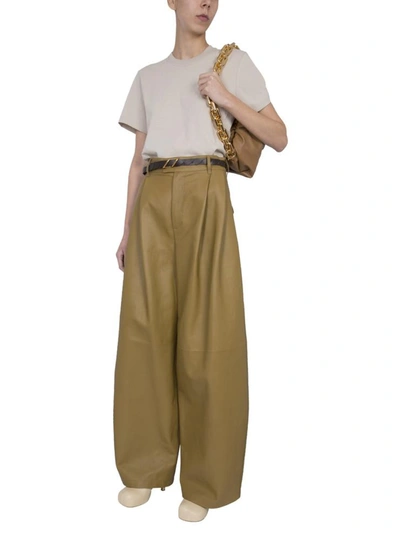 Shop Bottega Veneta Pants In Yellow