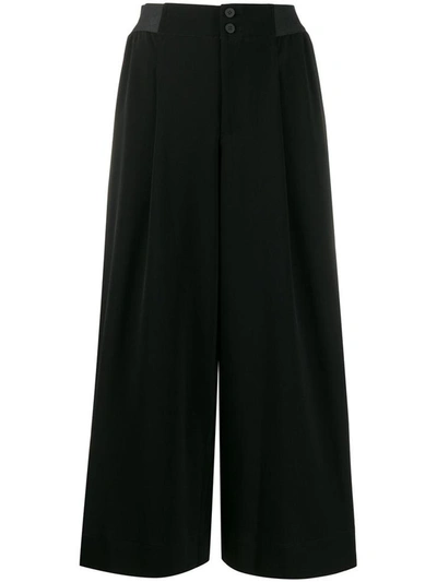 Shop Issey Miyake Trousers Black