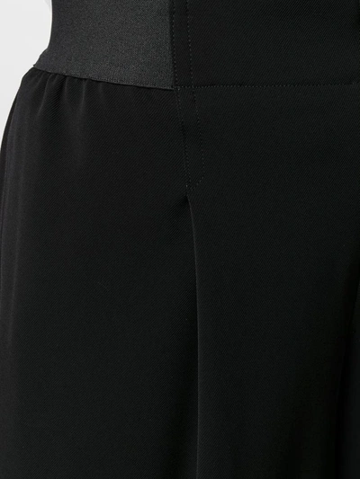 Shop Issey Miyake Trousers Black