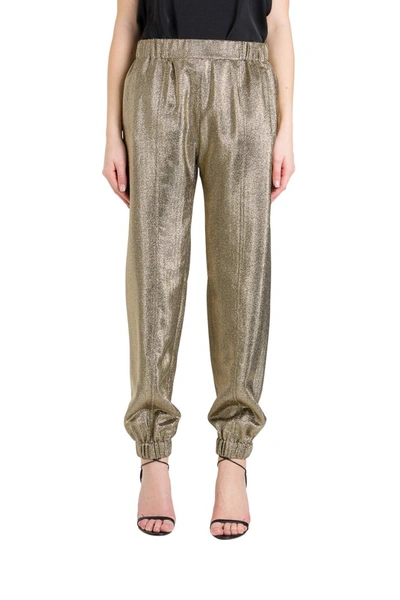 Shop Saint Laurent Gold Foil Trousers In Metallic