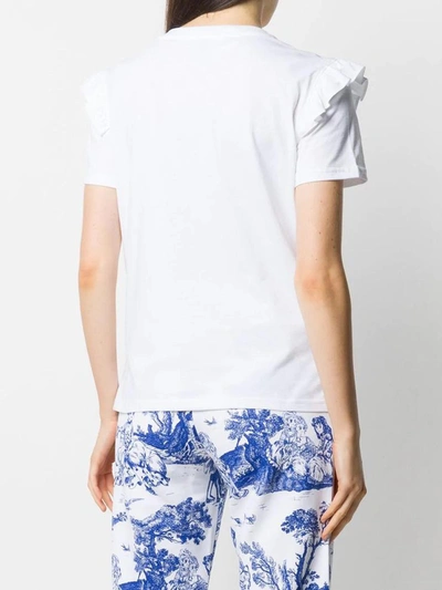 Shop Moschino T-shirts In Fantasy Print White