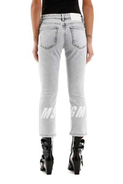 Shop Msgm Cropped Jeans With Logo On Back In Medium Blue