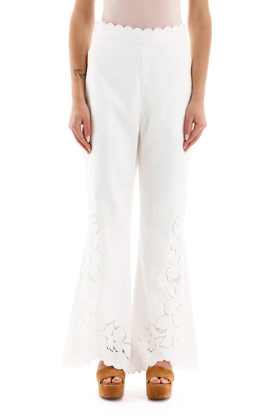 Shop Zimmermann Carnaby Flared Trousers In Ivory