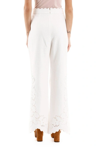 Shop Zimmermann Carnaby Flared Trousers In Ivory