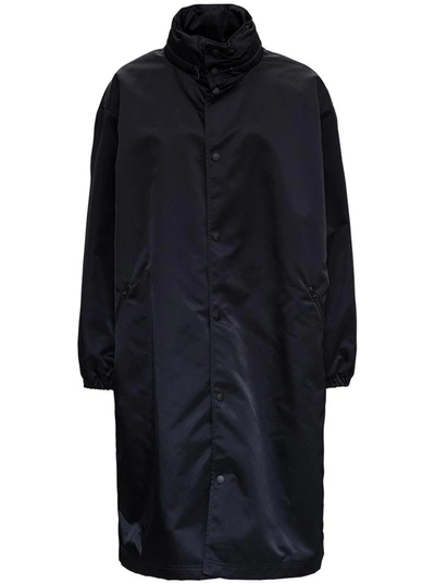 Shop Balenciaga Nylon Raincoat With Rear Logo Print In Black
