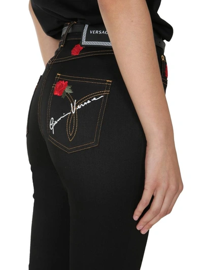 Shop Versace Denim Jeans In Black