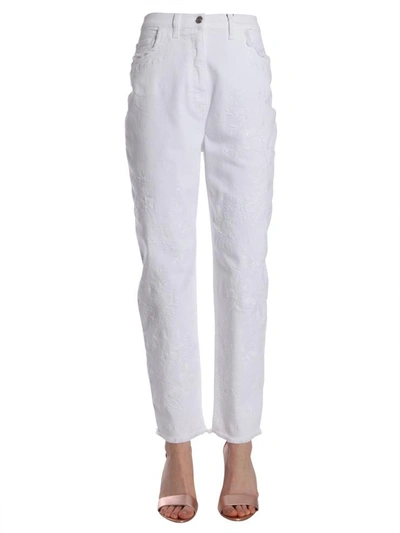 Shop Etro Embroidered Jeans In White