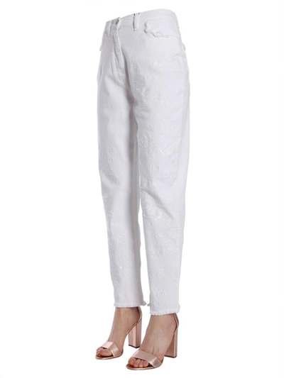 Shop Etro Embroidered Jeans In White