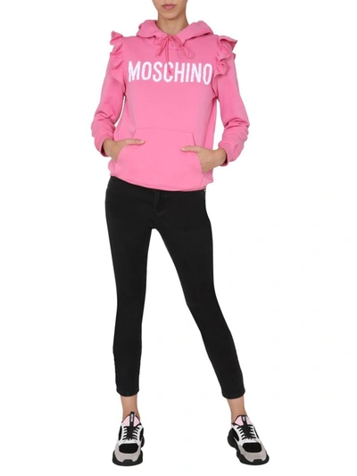 Shop Moschino Hoodie In Pink