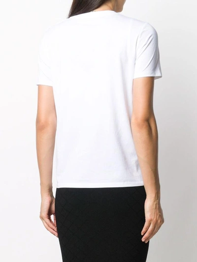Shop Balmain Jersey Tee With Logo And Embossed Buttons In White/black