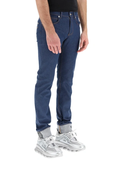 Shop Versace Taylor Fit Jeans With Greca In Blue